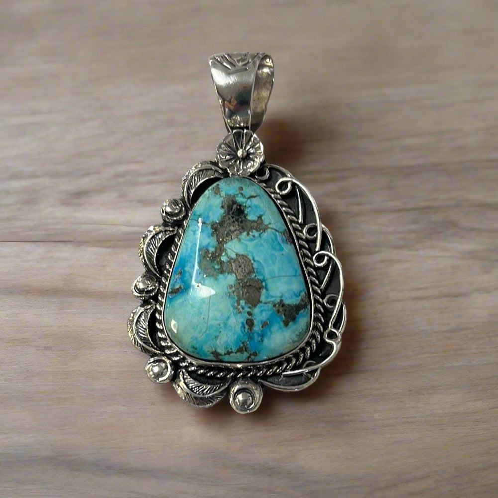 Large Nevada Turquoise Pendant with Ornate Silver Setting